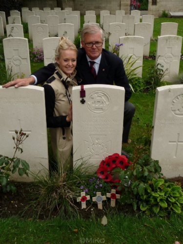 19 Holly and her father Ian Robertson at the grave of his gallant grandfather